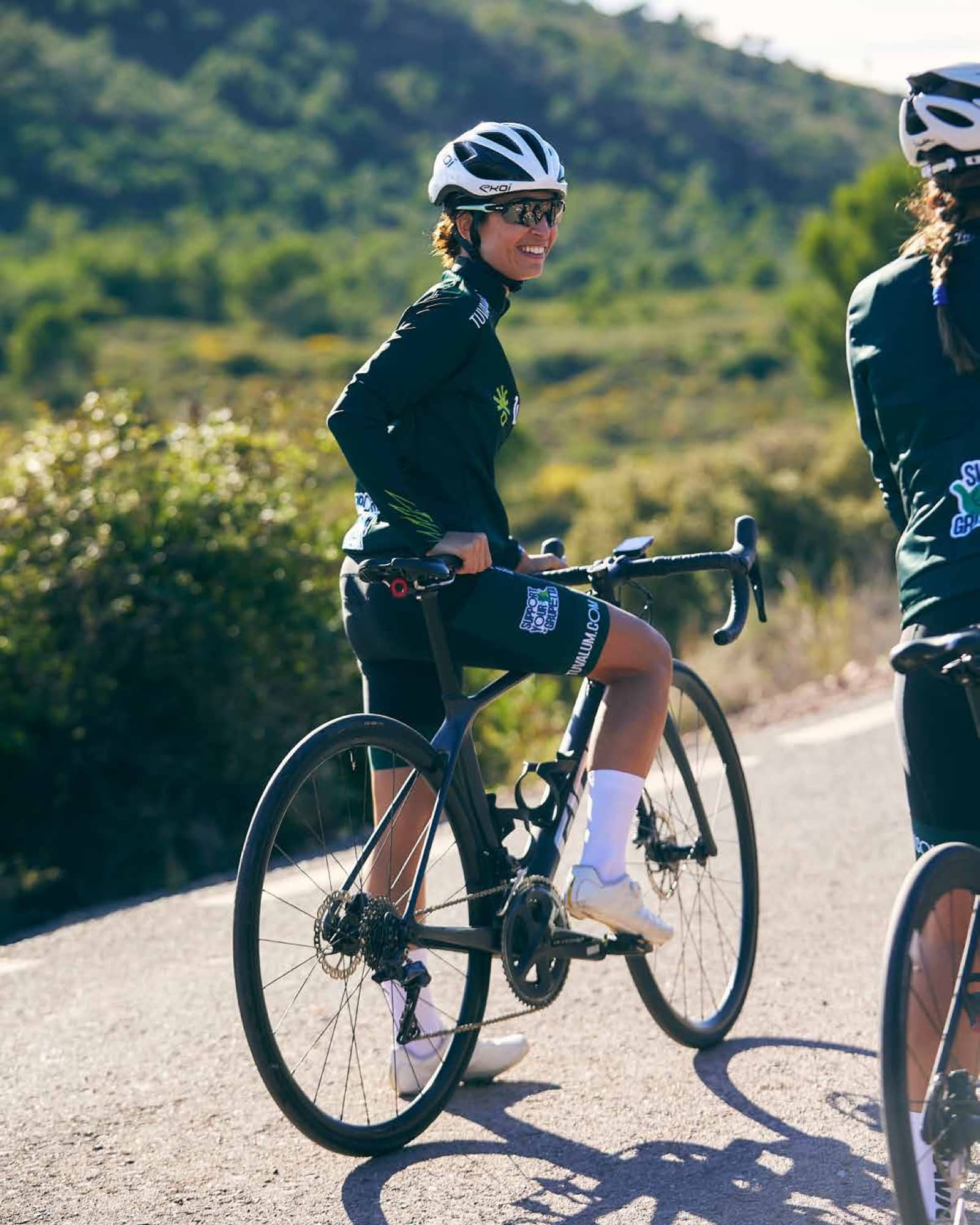 A smiling rider mid-tour — final celebration