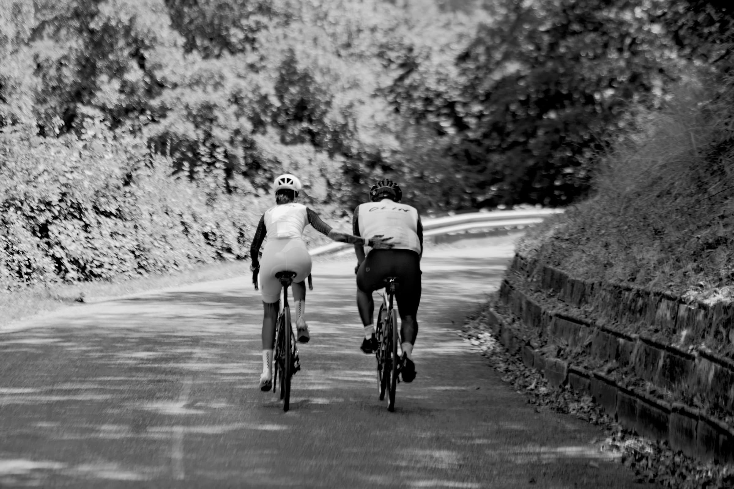 Two Olin riders side by side on a recent trip