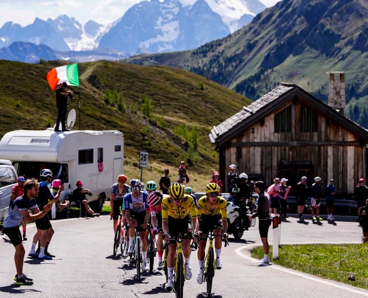 Giro d'Italia riders climbing a Dolomites mountain pass