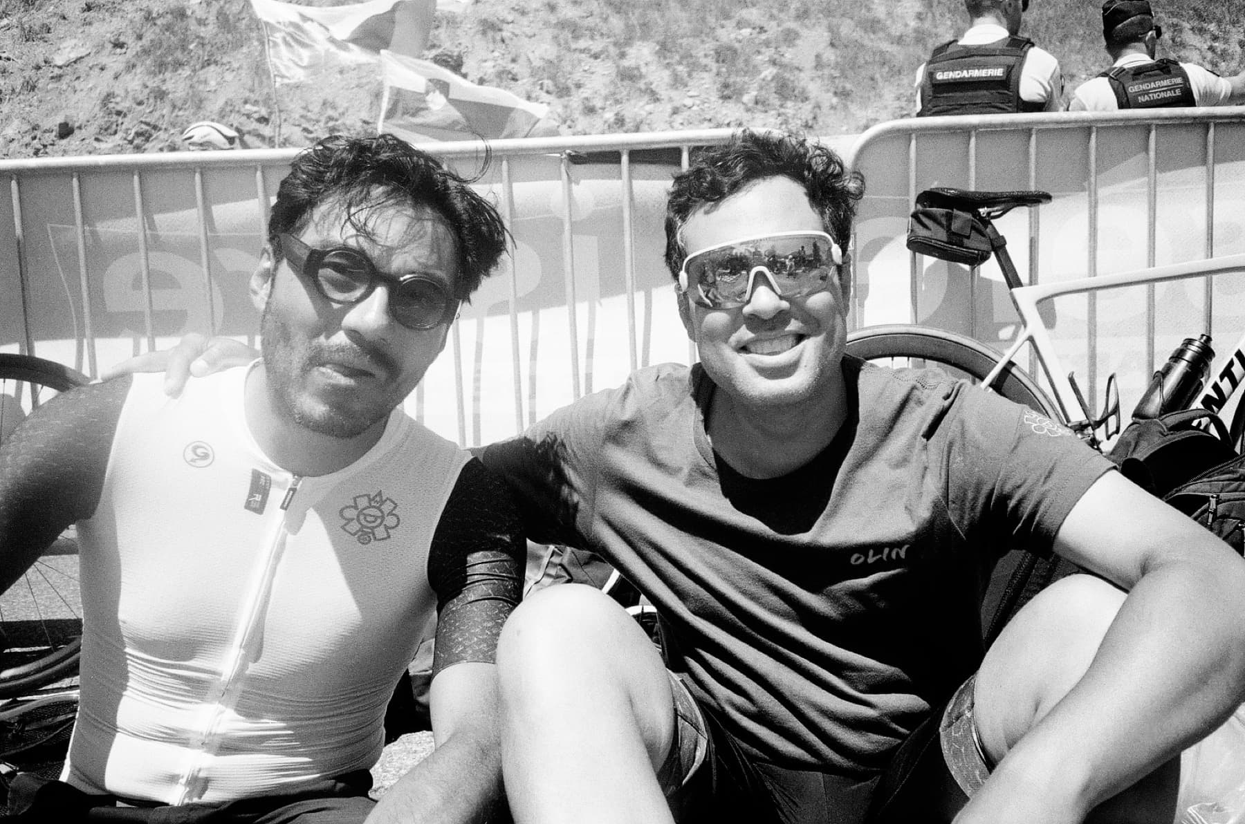 Two Olin riders sitting trackside after a ride